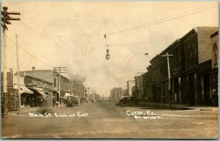 1911 Clyde,  Kansas Rppc Real Photo Postcard " Main Street Looking East " Downtown
