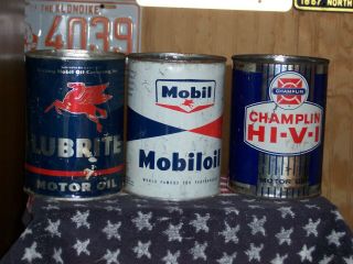 (3) Vintage one quart motor oil cans,  Mobil,  Champlin,  Lubrite 2