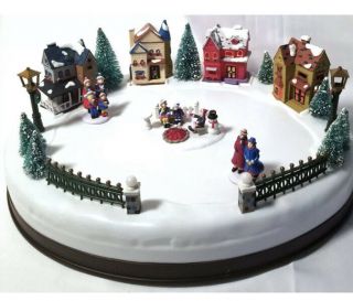 Happy Winter Holiday Olde Towne Carolers Animated Christmas Village Scene