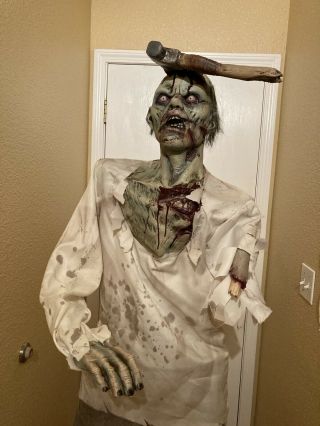 Spirit Halloween Axe ' d Zombie Life Size 6 ft.  Figure Prop Same Day Ship Retired 3