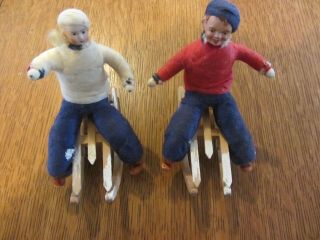 2 Rare Antique Vintage German Girl And Boy On Sleds Christmas Figures Germany