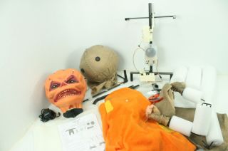 Spirit Halloween 4.  3 Ft Trick R Treat Sam Animatronic Two Head Options Orange