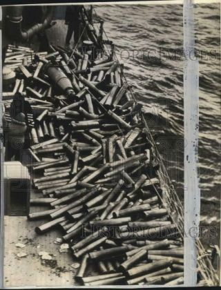 1942 Press Photo Empty Shell Casings Aboard Us Navy Ship In Alaska During Wwii