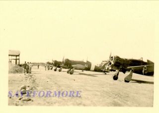 Wwii Photo: Gi’s Inspecting Captured Italian Fighters