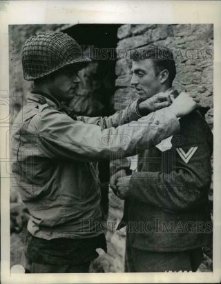 1944 Press Photo France,  A German Prisoner Is Tagged For Identification