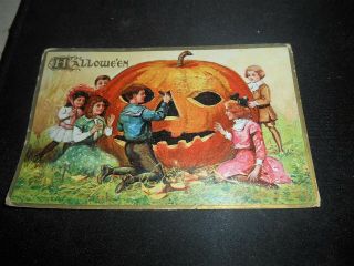 Vintage 1912 Embossed Halloween Postcard.  Children Carving Pumpkin.  L@@k