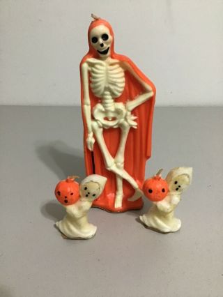 Gurley Halloween Candles 8.  5” Skeleton In Orange Shroud And 2 Small Ghosts 3.  25”
