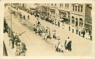 C - 1910 Parade Native American Indian Headdress Music Band Photo Postcard 7607