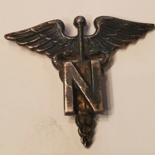 Wwii Us Army Air Corps Nurse Caduceus Wings Pinback.  Silver (?).