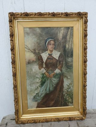 Early 1900s Oil On Canvas Painting Of A Young Brittany Woman In Floral Frame