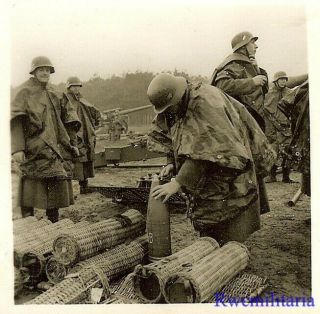 Best Wehrmacht Artillerymen In Camo Ponchos Readying 15cm Shells For Use