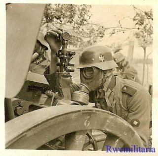 Apocalyptic Wehrmacht Artillerymen W/ Gas Masks On Readying To Fire Gun