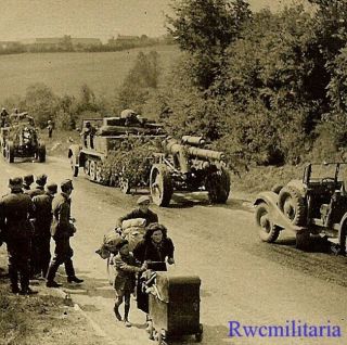 Move West Wehrmacht Column W/ Sdkfz Halftrack Towing 15cm Artillery On Road