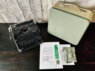 1960 Olympia Sm - 4 Portable Typewriter With Case,  Manuals,  And Brushes
