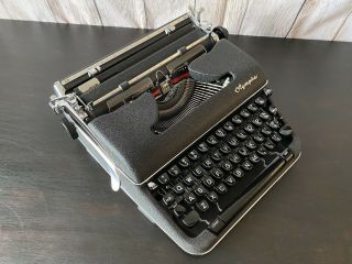 1960 Olympia SM - 4 Portable Typewriter With Case,  Manuals,  And Brushes 3