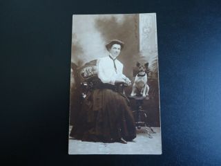 Women With Dog Sitting On A Chair Early 1900 