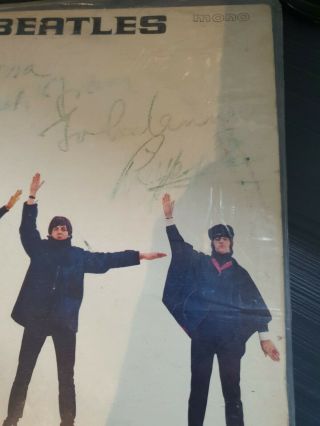 The Beatles Help vinyl.  Autographed to my mum but fading.  PMC 1255 E.  M.  I RECORDS 2