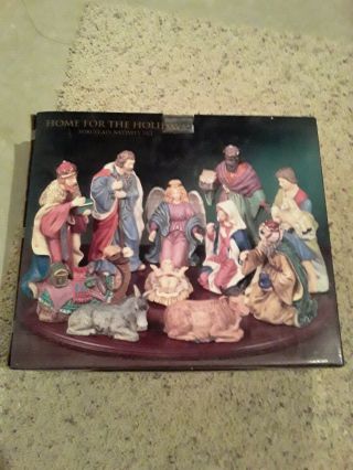 Almost New1999 Home For The Holidays 12 Piece Porcelain Nativity Set & Wood Base