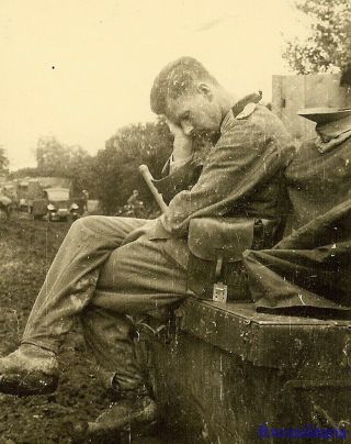 Port.  Photo: Exhaustion Wehrmacht Combat Infantryman Sleeps On Wagon; Russia