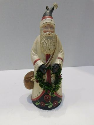 Xmas Decor Ornament 6.  5 " Tall Resin Santa Dressed In White Holding Wreath