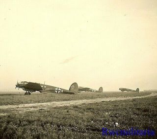 Port.  Photo: Best Luftwaffe He - 111 Bombers Dispersed In Open On Airfield