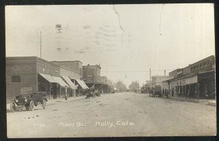 1919 Rppc,  Main St.  Holly,  Co.  Barber Pole,  Storefronts & Old Cars,  Garage Sign