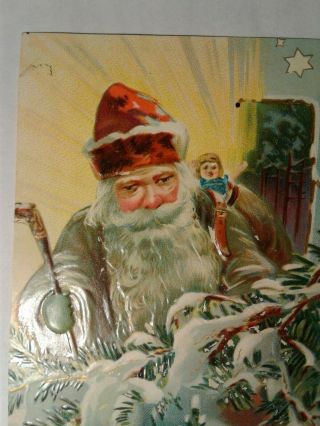 Old Christmas Postcard by Tuck & Sons,  Santa in a Green Coat 2
