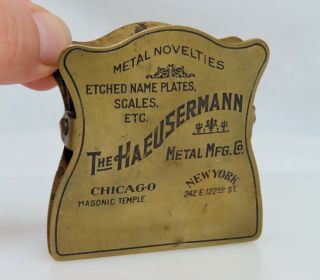 The Haeusermann Vintage Antique Advertising Brass Paper Clip - 80577