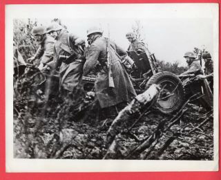 Ww2 German Soldiers Pulling Anti - Tank Gun Up Hill 7x9 News Photo