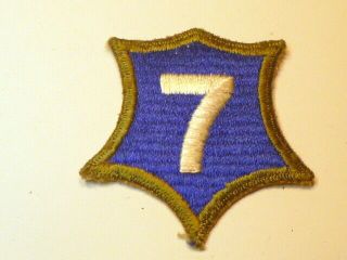 A WW 2 U S Army 7th Corps O D Border Ribbed Cut Edge White Back Patch 2