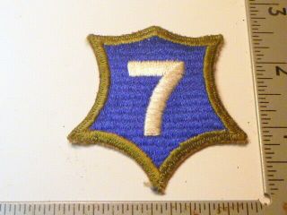 A WW 2 U S Army 7th Corps O D Border Ribbed Cut Edge White Back Patch 3