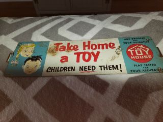 Vintage Take Home A Toy Metal Sign