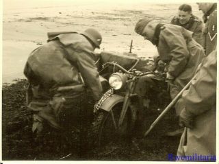 Port.  Photo: STUCK Wehrmacht Kradmelder w/ Motorcycle in Muddy Riverbank (2) 2