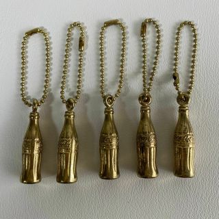 Five (5) Mini Gold Colored Coca - Cola Bottle Key Chains