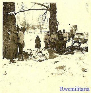 Somber Bundled Wehrmacht Troops Burying Kia Comrade In Winter; Russia