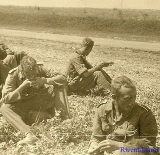 Port.  Photo: Exhaustion Wehrmacht Combat Infantry Soldiers Resting; Russia