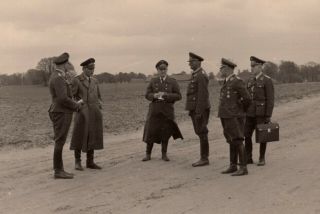 Wwii German Luftwaffe High Ranking Officers Having A Conversation On The Road