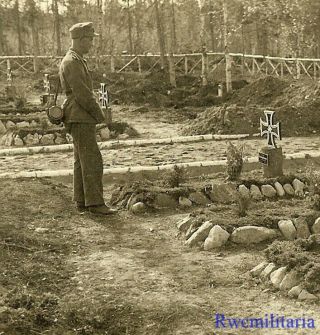 Somber German Gebirgsjäger Soldier Viewing Kia Comrade Graves In Field