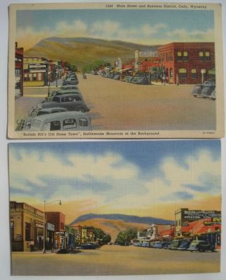 2 Cody Wy Main Street Scenes; Old Cars Vintage Linen Ca.  1940s Postcards