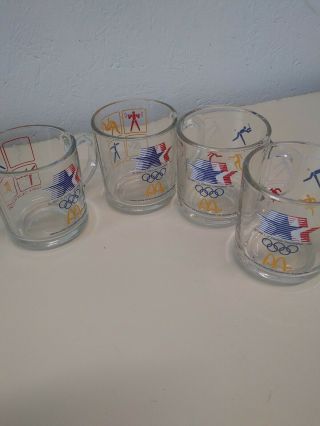 Set Of 4 Mcdonalds 1984 Olympic Coffee Cups Mugs Clear Glass