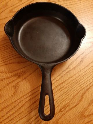 Griswold Cast Iron Skillet 4 Small Logo