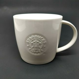 Starbucks 2009 White Siren Embossed Bone China Coffee Mug 16 Oz.