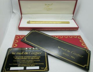 Cartier.  " Les Must De Cartier ".  Gold Ballpoint Pen,  With Boxes & Certification