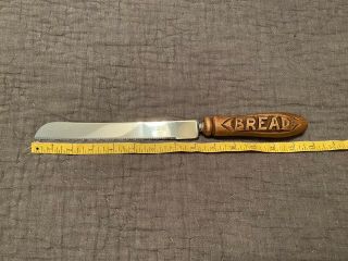 Sheffield England Bramhall Bread Knife Wood Carved Handle Serrated Blade