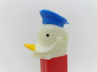 Rare And Donald Duck On A Red " Made In Spain " Stem,  Thin Feet Pez Dispenser