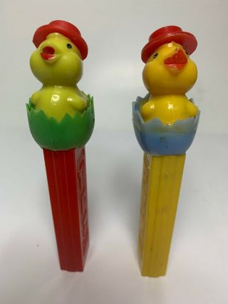 2 Vintage Pez Dispensers - Two Different Baby Chicks In Eggs.  - No Feet