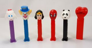 6 Pez Dispensers Wonder Woman Panda Spiderman Valentine Heart Bozo Lamb Chop