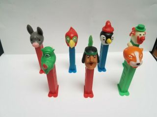 7 Pez Dispensers Merry Music Makers Donkey Clown Penguin Indian Parrot Rhino