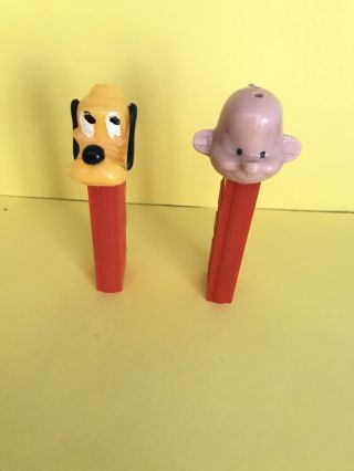 2 Vintage No Feet Pez Dispensers - Pluto And Girl (missing Hair)