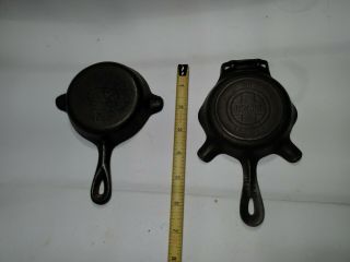 Griswold 00,  579,  & Wagner ware 1050 Pair cast iron ashtrays 2